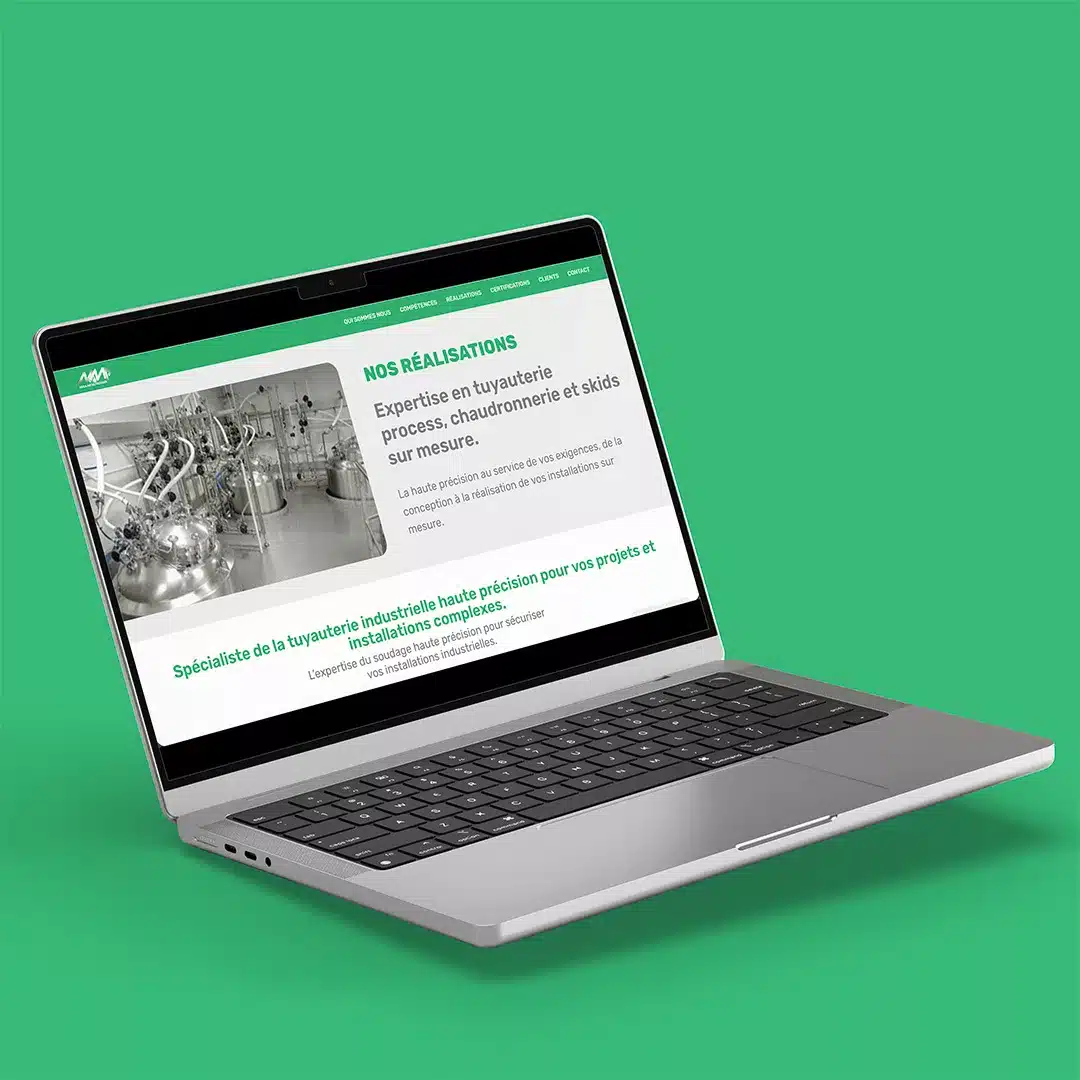 Site Méca-Métal Process sur ordinateur portable, fond vert